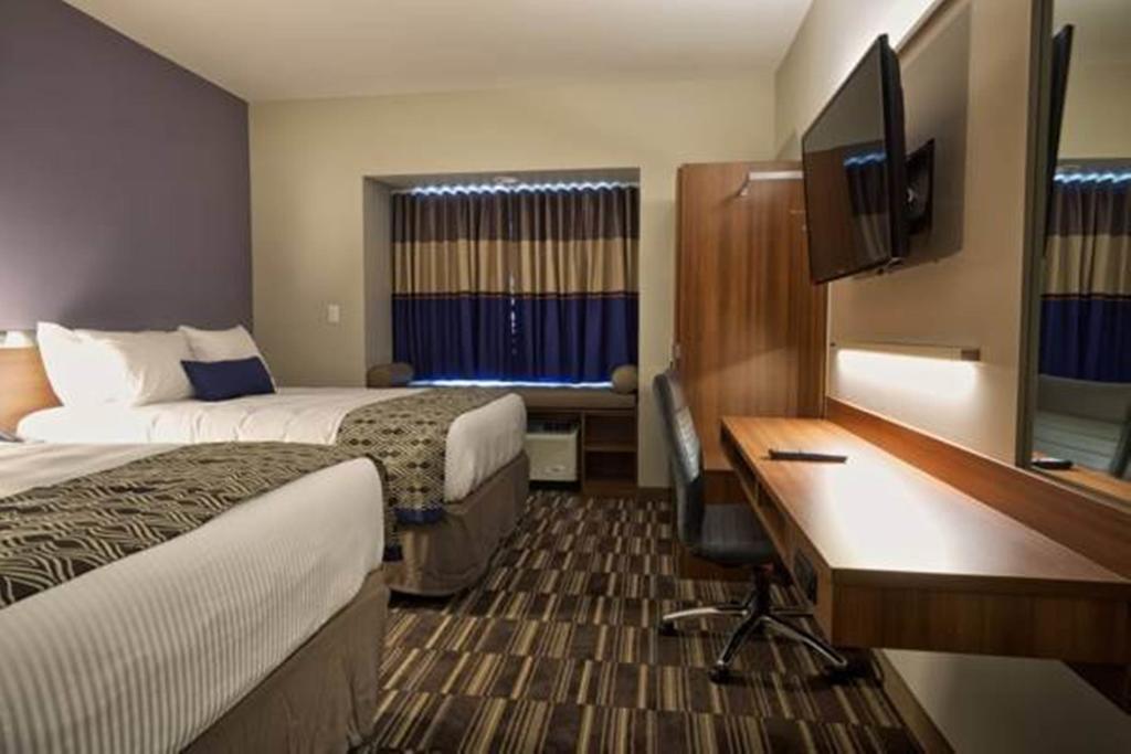 Microtel Inn & Suites Су-Сент-Марі Номер фото